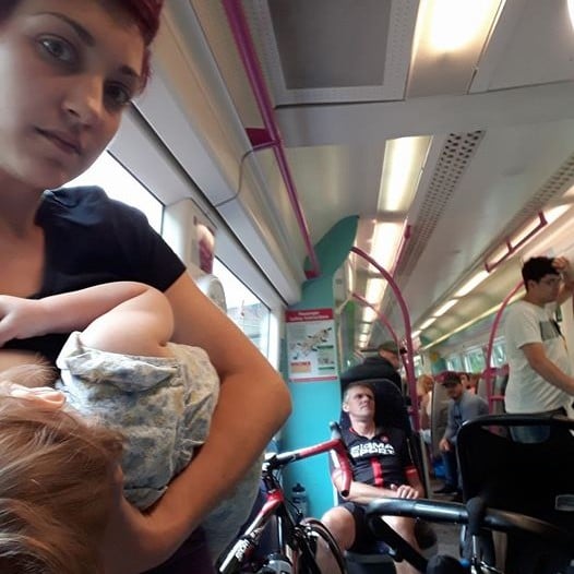 Breastfeeding Mom Forced to Stand on Train While Men Sit