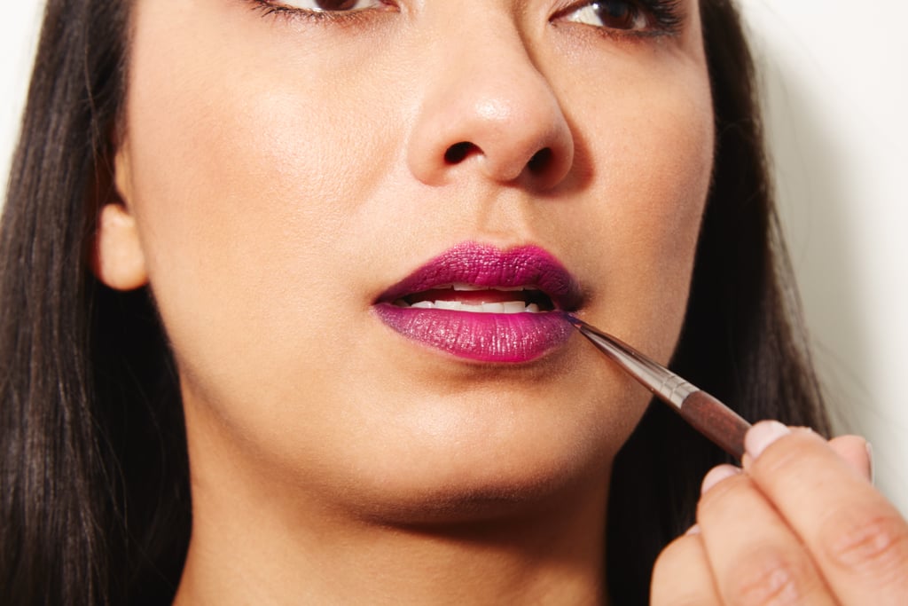Step 4: Blend the black lipstick in upward motions.