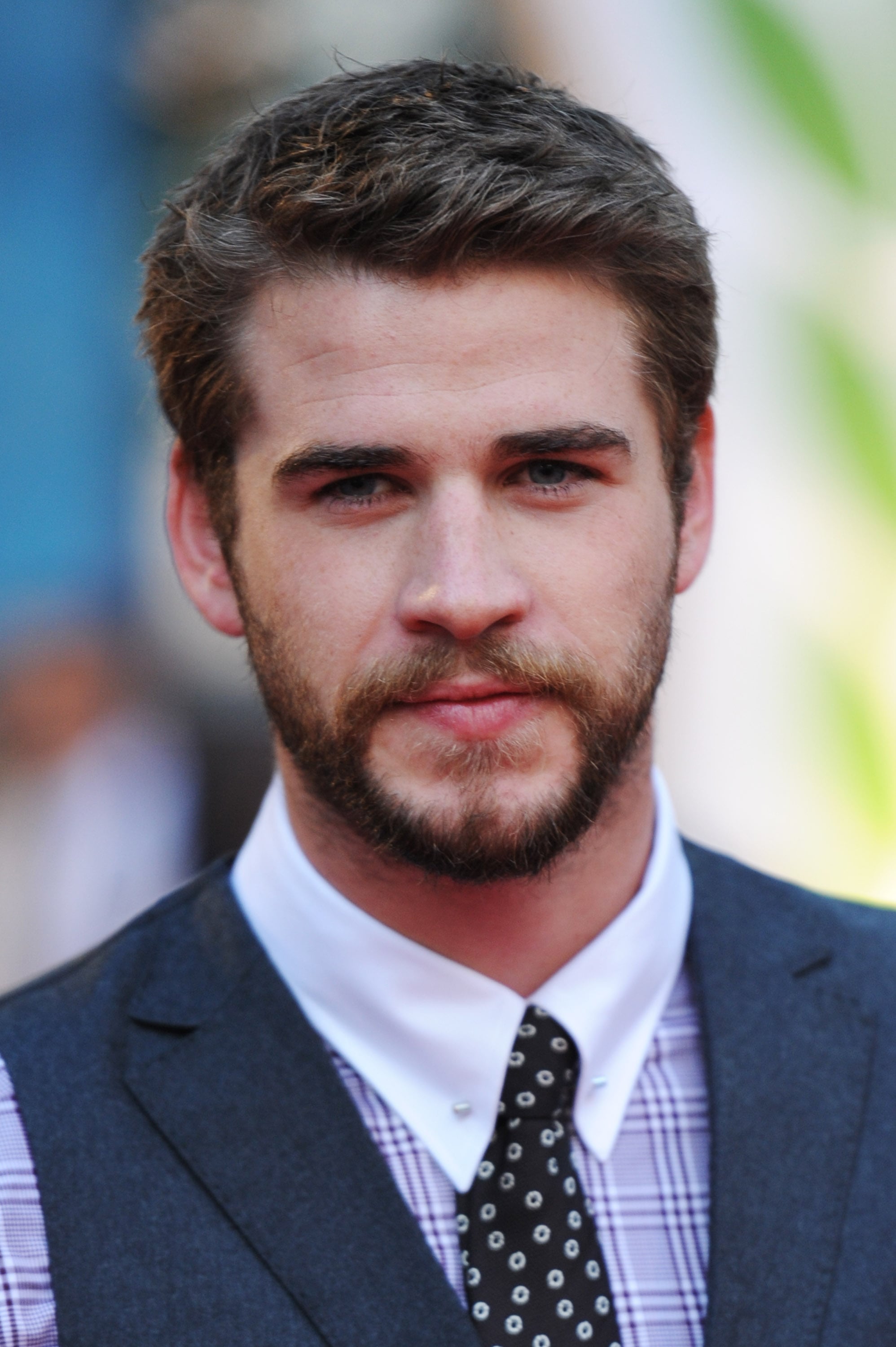 Liam Hemsworth Smiled While Posing On The Red Carpet Olivia Wilde Does Menswear Even Better Than The Hemsworth Brothers Popsugar Celebrity Photo 8 See more of chris and liam hemsworth smile on facebook. liam hemsworth smiled while posing on