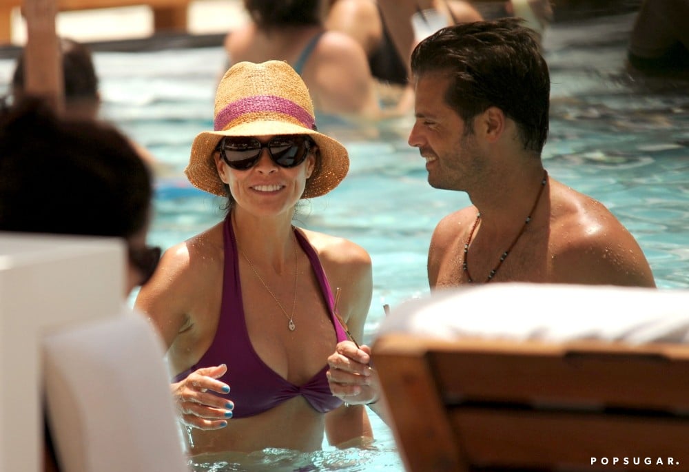 Brooke Burke and her husband, David Charvet, cozied up in the pool in Miami in July 2012.