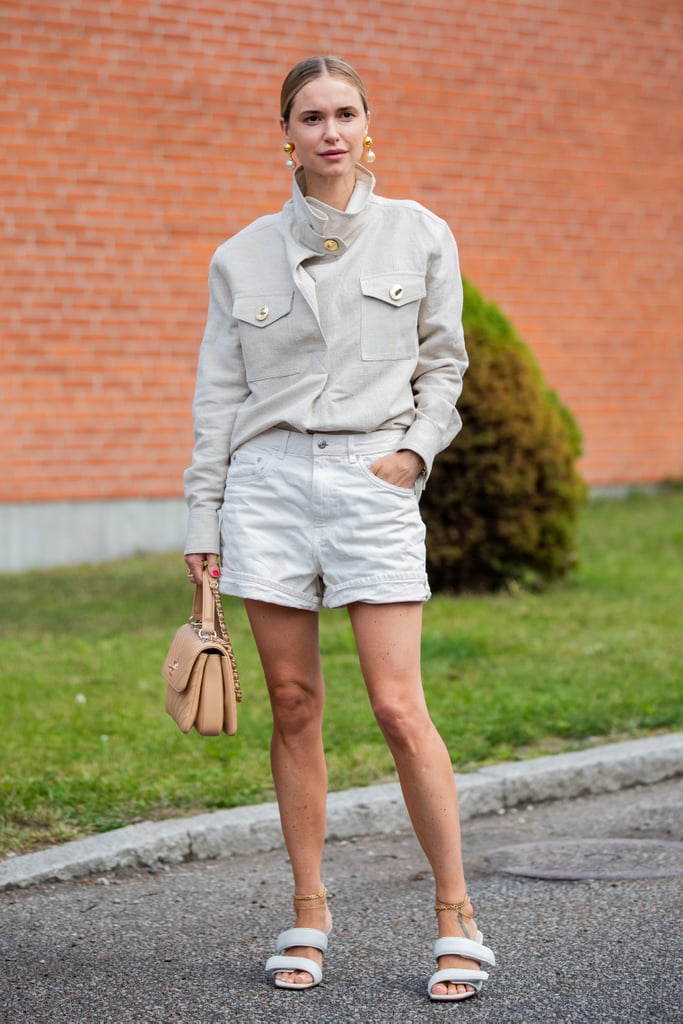 A button-down and denim shorts is the look that will forever span nearly all months of the year, with just a little extra layering power on particularly cold days.