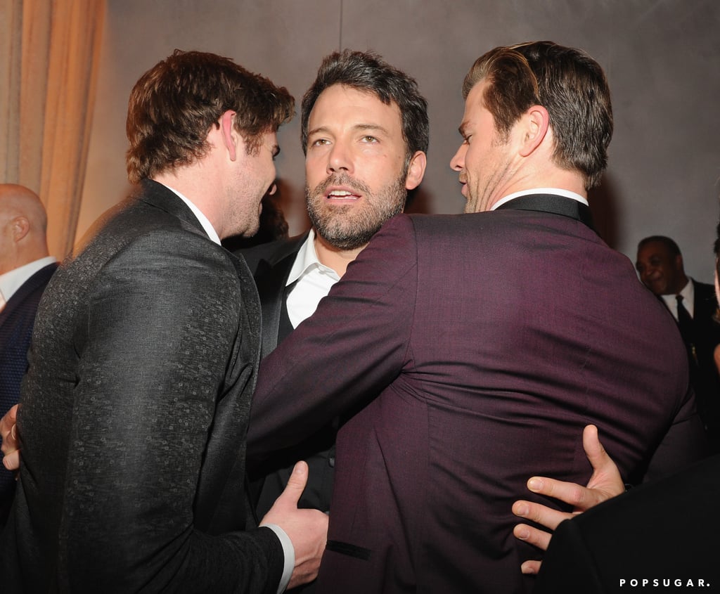 Ben Affleck was in the middle of a Hemsworth brothers sandwich at the Vanity Fair Oscars afterparty.