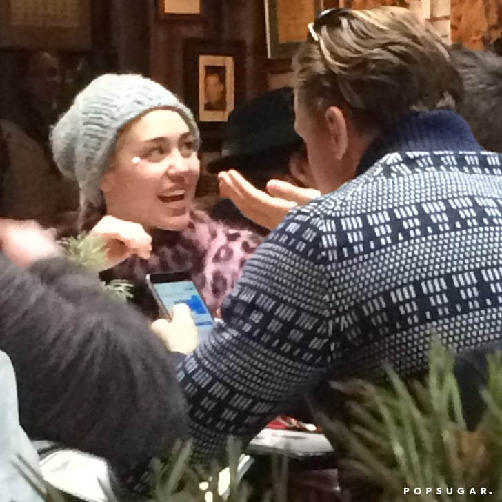 Miley Cyrus With Patrick And Arnold Schwarzenegger Photos