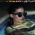 Kylie Jenner Takes a Dip in a Black Thongkini For Her Latest Shoot