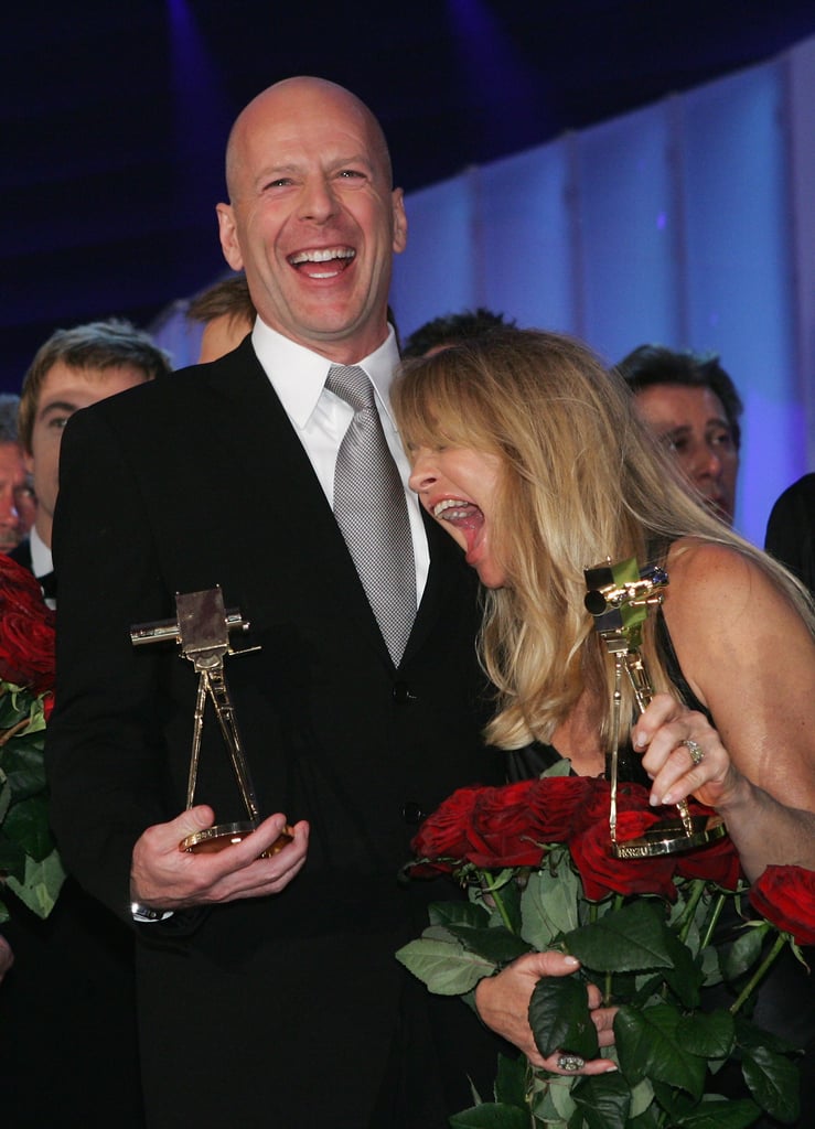 Bruce Willis got a kick out of Goldie at the 2005 Goldene Kamera Awards.