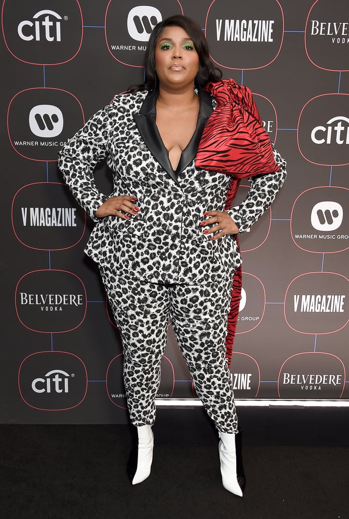 As if the black and white leaopard print suit didn't look good enough on its own, Lizzo paired the outfit with a pair of boots à la Cruella Deville that create the coolest optical illusion.