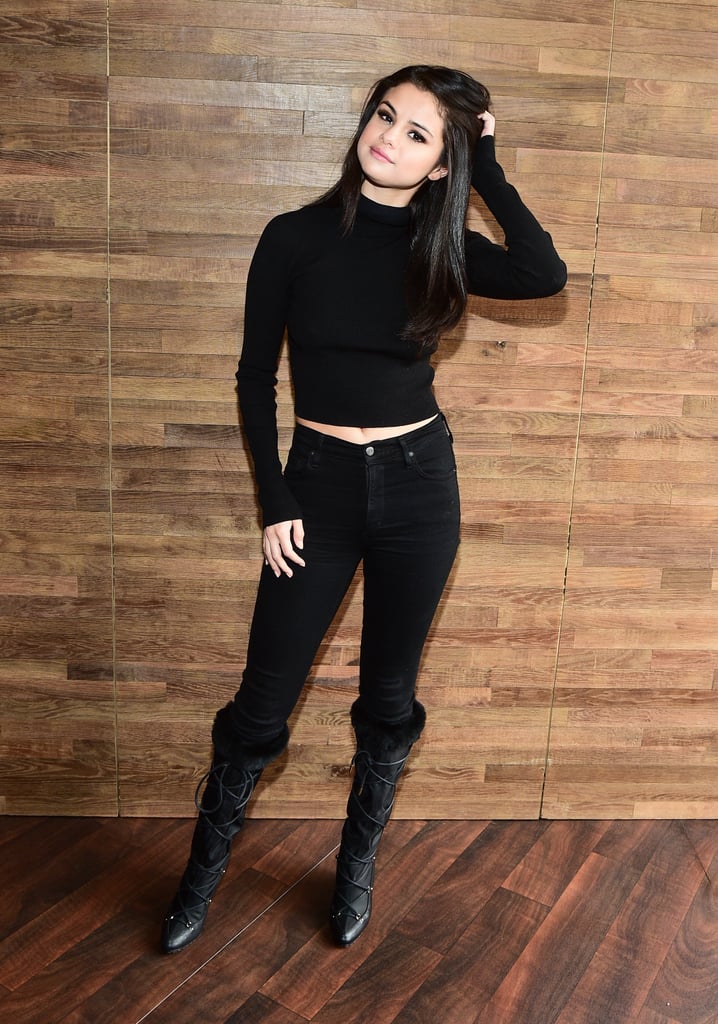 For a cold day promoting her movie The Fundamentals of Caring at the 2016 Sundance Film Festival, Selena chose all black: a long-sleeved turtleneck top and skinny jeans tucked into snow boots.