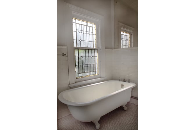 While the bathrooms in the home need TLC, this clawfoot tub looks like a relaxation-lover's dream come true.