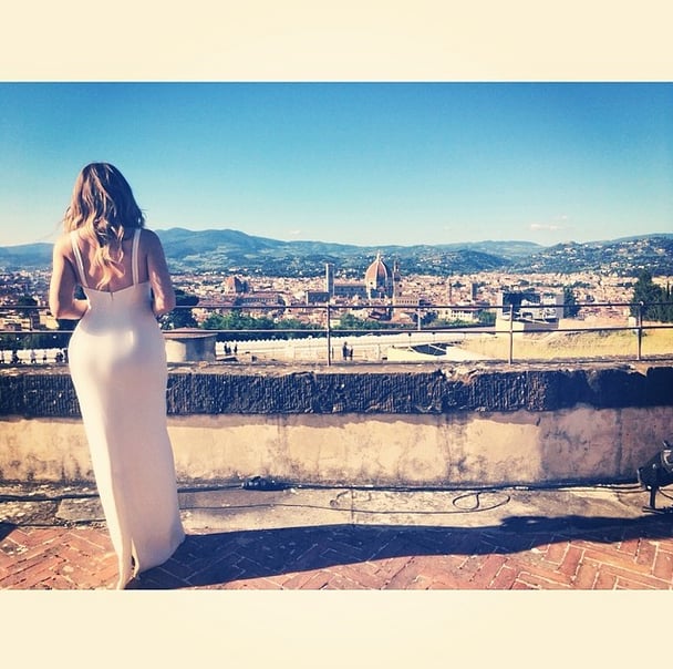 Khloe took in the view from the wedding's location while in her bridesmaid dress.
Source: Instagram user khloekardashian