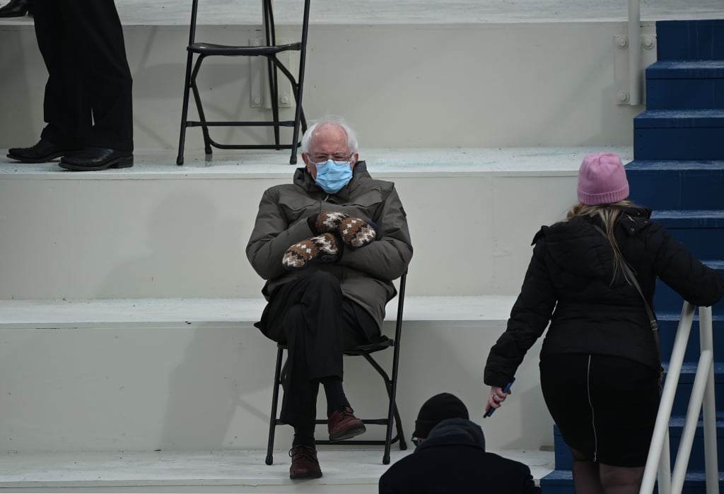 Bella Hadid Wearing Colourful Gloves With Black Prada Coat