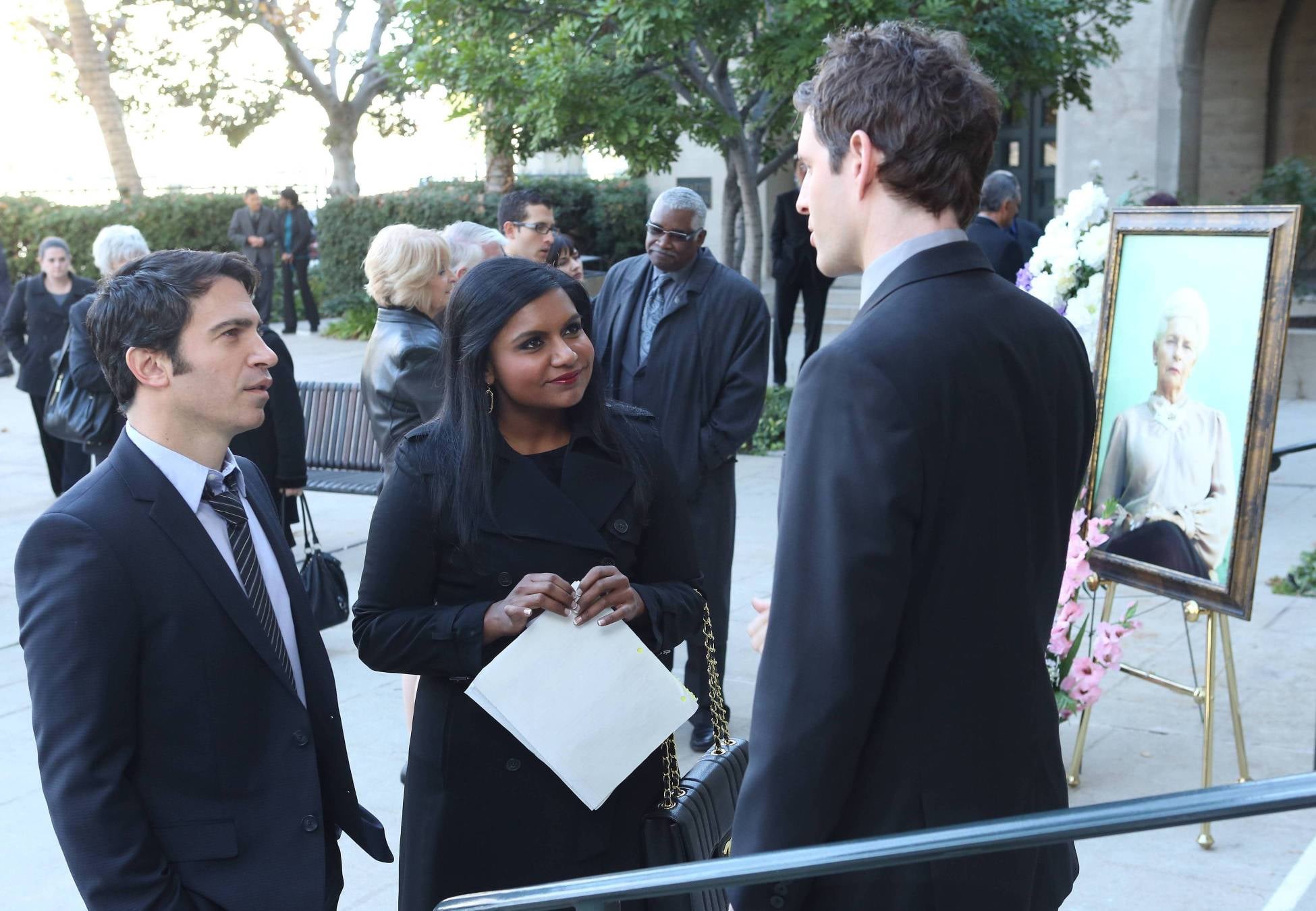 Danny (Chris Messina) and Mindy (Mindy Kaling) attend Cliff's (Glenn Howerton) grandmother's funeral.
