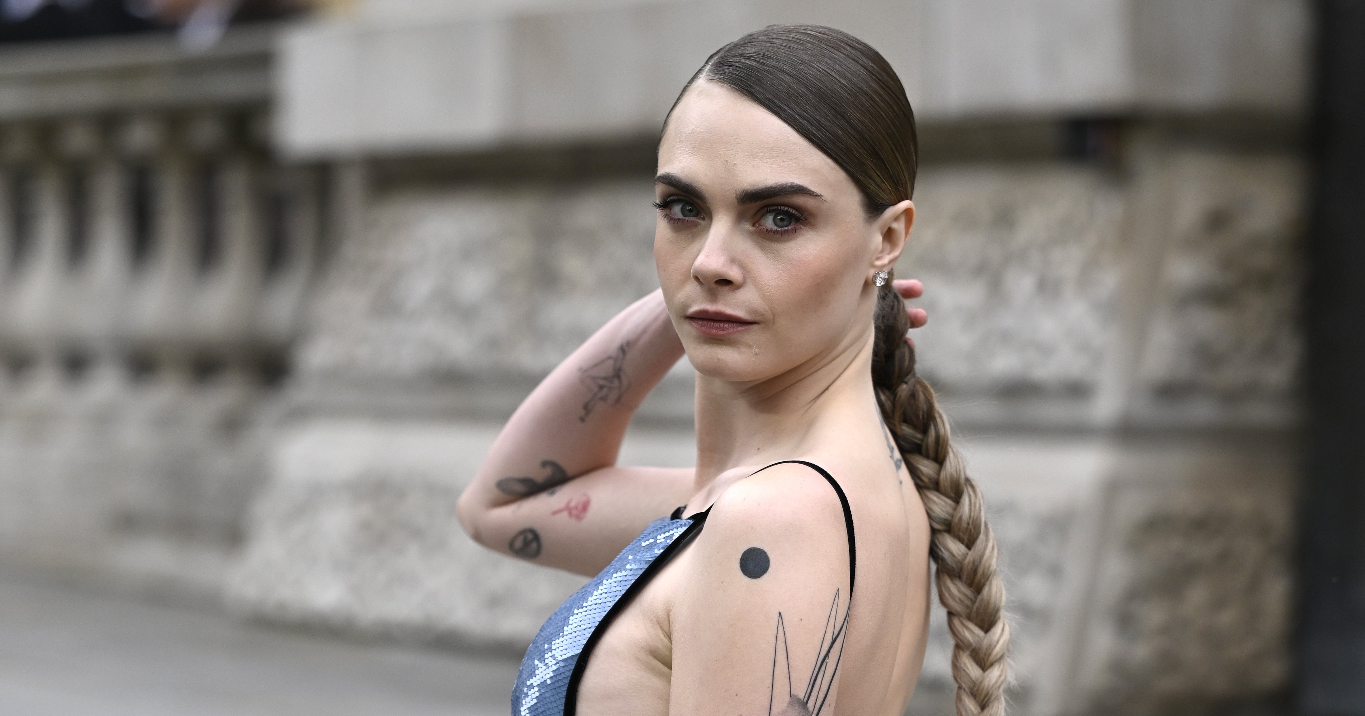 A Guide to Cara Delevingne’s 20+ Tattoos and Their Meanings