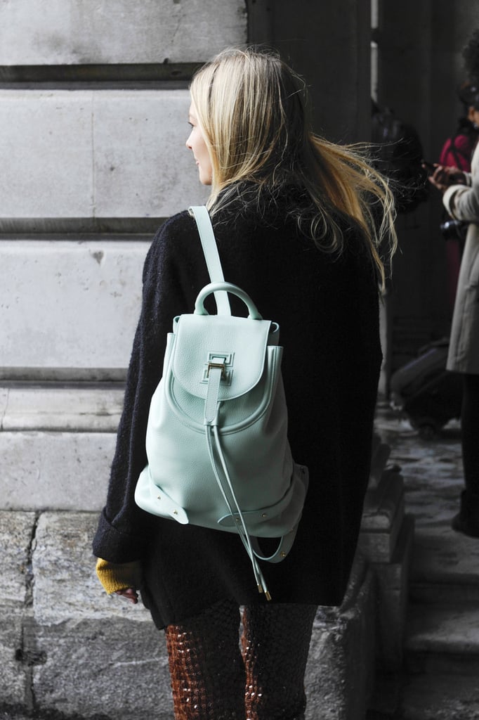 She gave us a glimpse of Spring with a mint-green backpack.