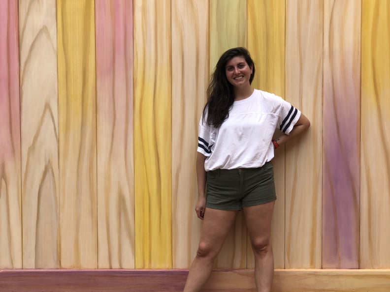Take a photo in front of the popsicle stick wall outside the exit of Toy Story Mania.
