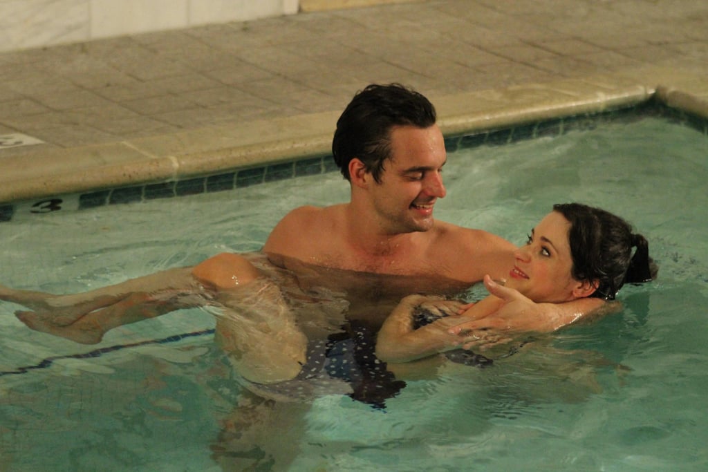 Nick shows Jess the art of "water therapy," and she looks pretty happy in his arms.