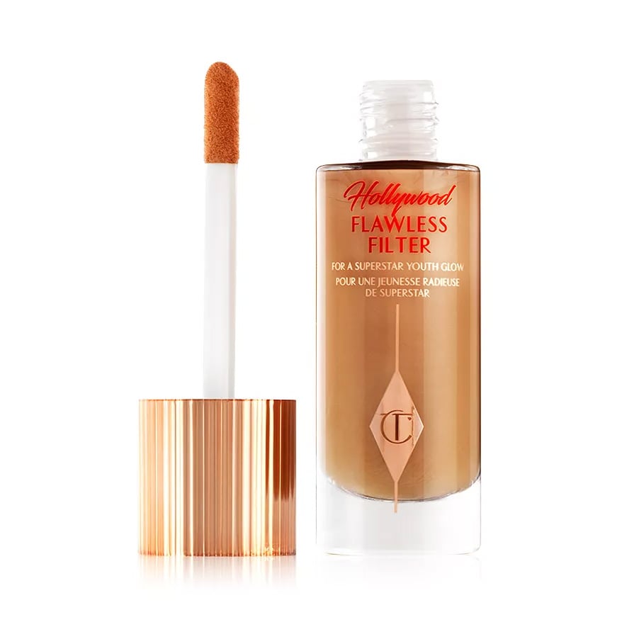 Charlotte Tilbury Hollywood Flawless Filter ($49)
Part concealer, part foundation, all-around luminizer, this hybrid product lightly covers and evens tone while adding the kind of summer glow that takes weeks in Mykonos to achieve. The wide, doe-foot applicator makes spot-concealing easy, but its best achievement is illuminated skin that doesn't look greasy or robotic.