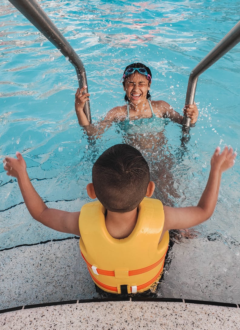 Children should become used to the shallow end of the pool first.