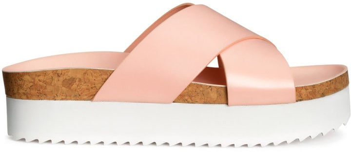 Give yourself a leg up with a sleek and minimal flatform like this white and peach style.
Platform Sandals ($30)