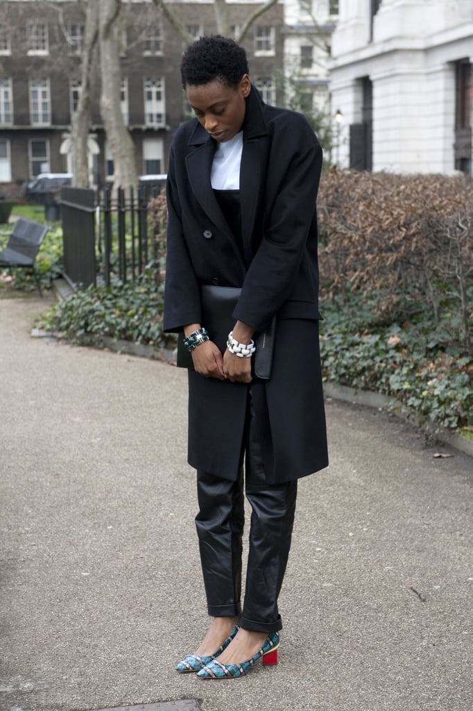 Leather pants are totally office-appropriate with chic low heels and a smart overcoat.
