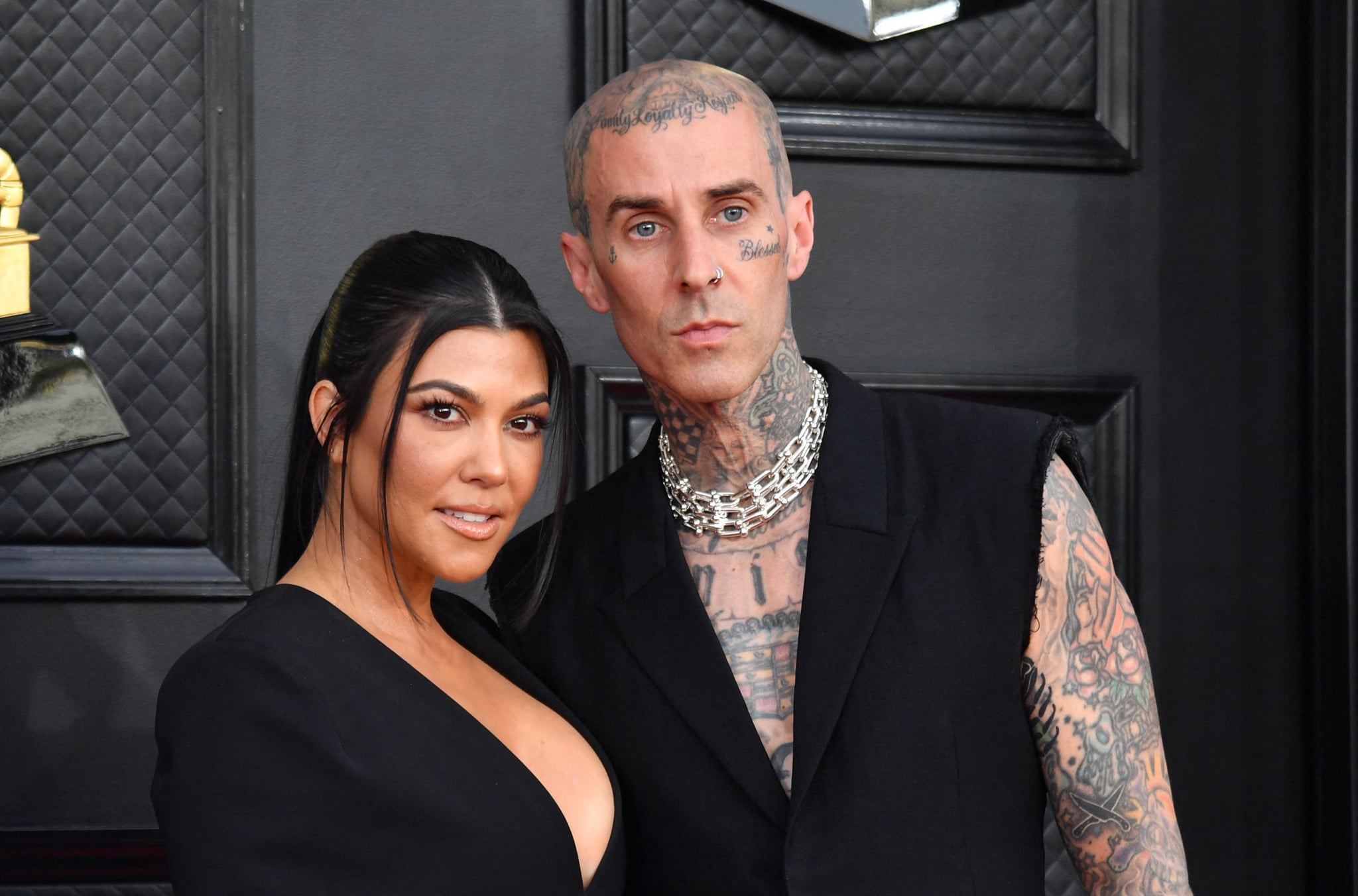 Kourtney Kardashian and musician Travis Barker arrive for the 64th Annual Grammy Awards at the MGM Grand Garden Arena in Las Vegas on April 3, 2022. (Photo by ANGELA  WEISS / AFP) (Photo by ANGELA  WEISS/AFP via Getty Images)