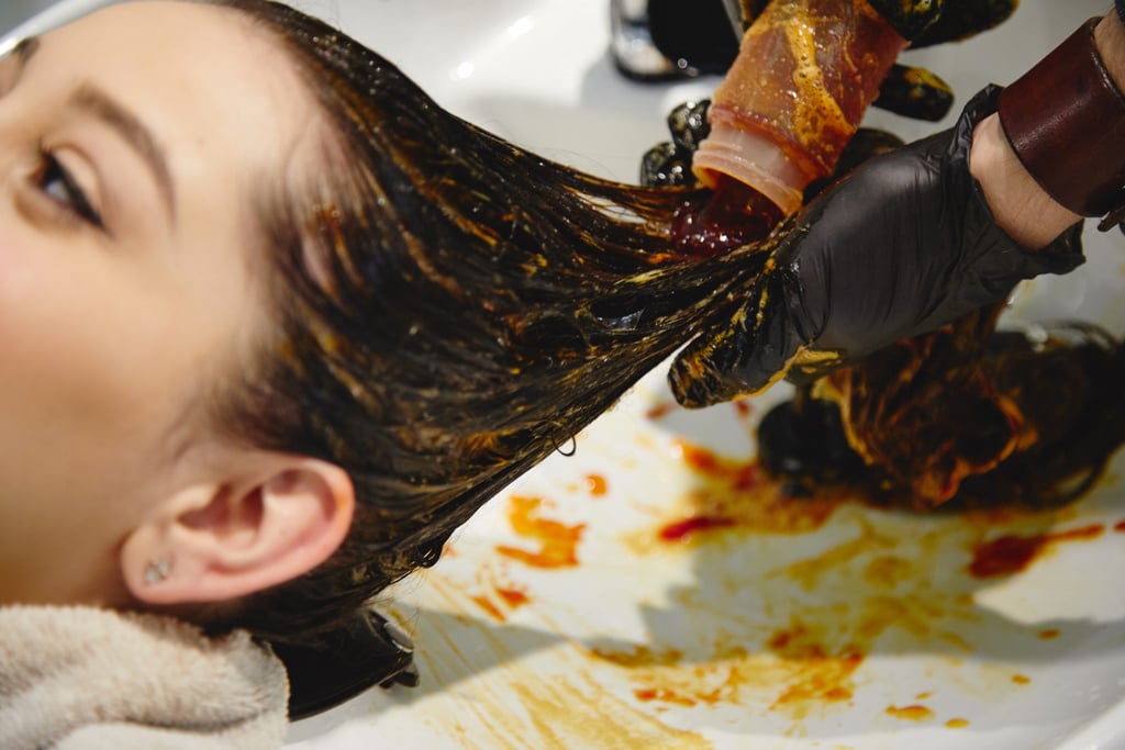 He worked the dye through my strands while I envisioned my new, moodier hair. Although the hair dye looks ultra orange in the photos, it's important for hair-dye newbies to know that the color of the dye is not the exact hue your hair will come out like.