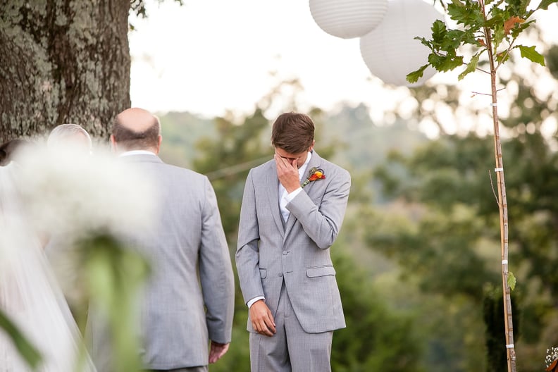 Groom Watching the Bride Walk Down the Aisle