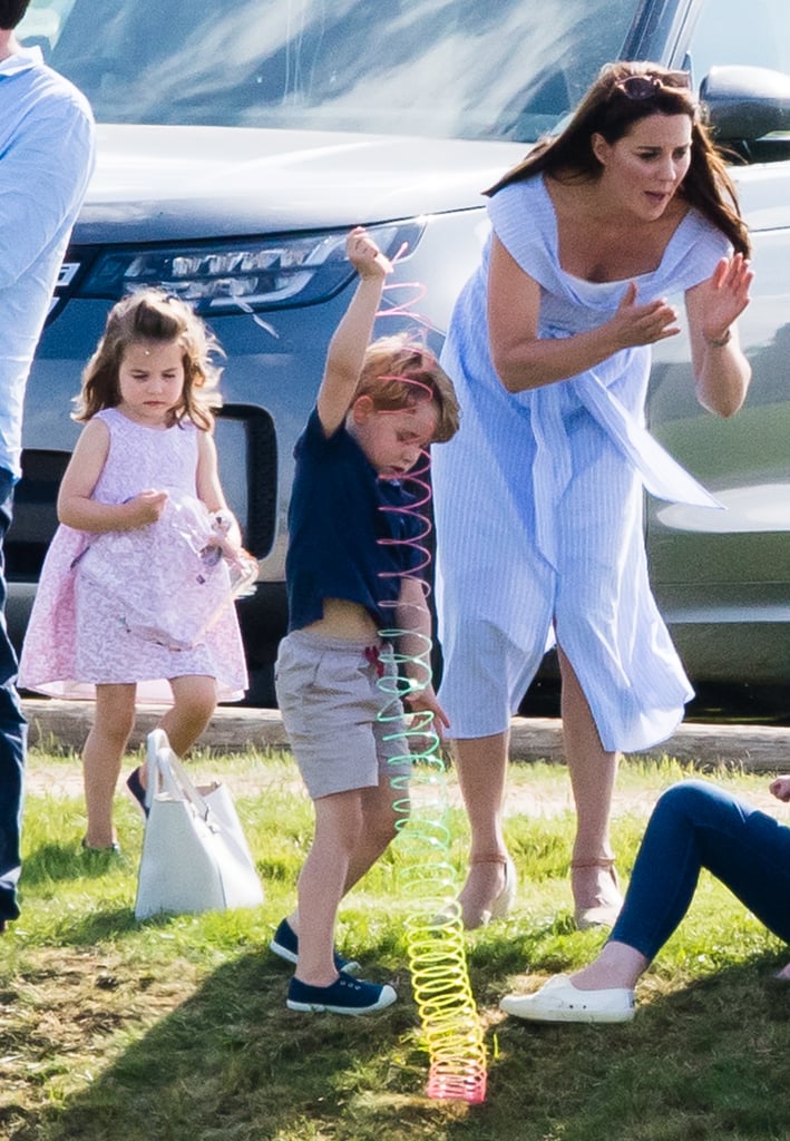 For George, the slinky was still holding strong here, but zoom in on the little princess and feel our dread — Charlotte has clearly moved on, and she's got her eye on the prize.