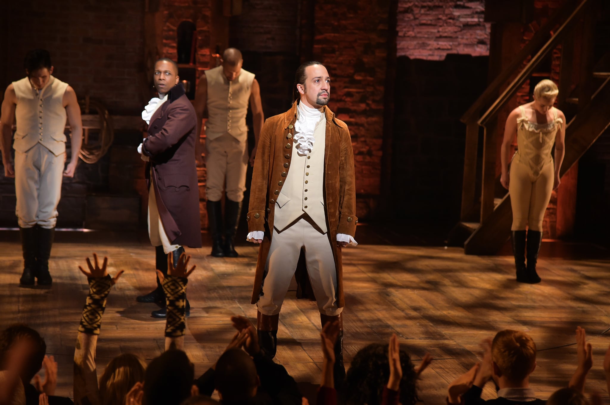 NEW YORK, NY - FEBRUARY 15:  Actor Leslie Odom, Jr. (L)  and actor, composer Lin-Manuel Miranda (R) and cast of 