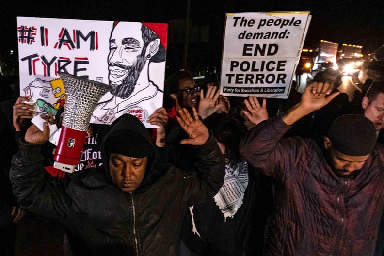 TOPSHOT - Protesters block traffic as they rally against the fatal police assault of Tyre Nichols, in Memphis, Tennessee on January 27, 2023. - The US city of Memphis released January 27, 2023 graphic video footage depicting the fatal police assault of a 