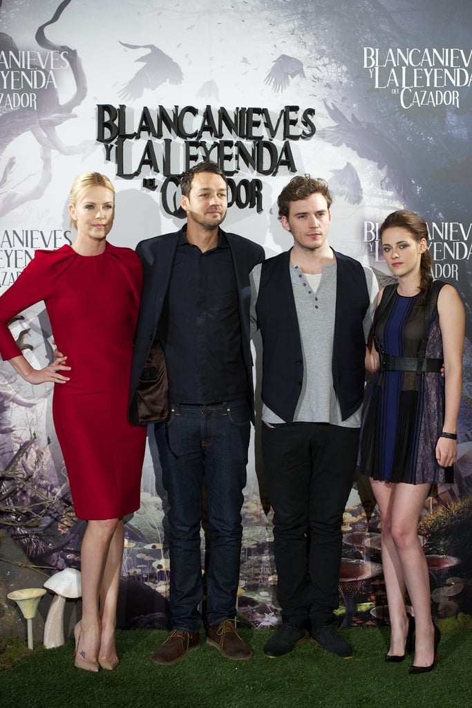 Charlize Theron, Rupert Sanders, Sam Claflin, and Kristen Stewart posed together for the Snow White and the Huntsman photocall in Madrid.
Charlize Theron, Rupert Sanders, Sam Claflin, and Kristen Stewart posed together for the Snow White and the Huntsman photocall in Madrid.