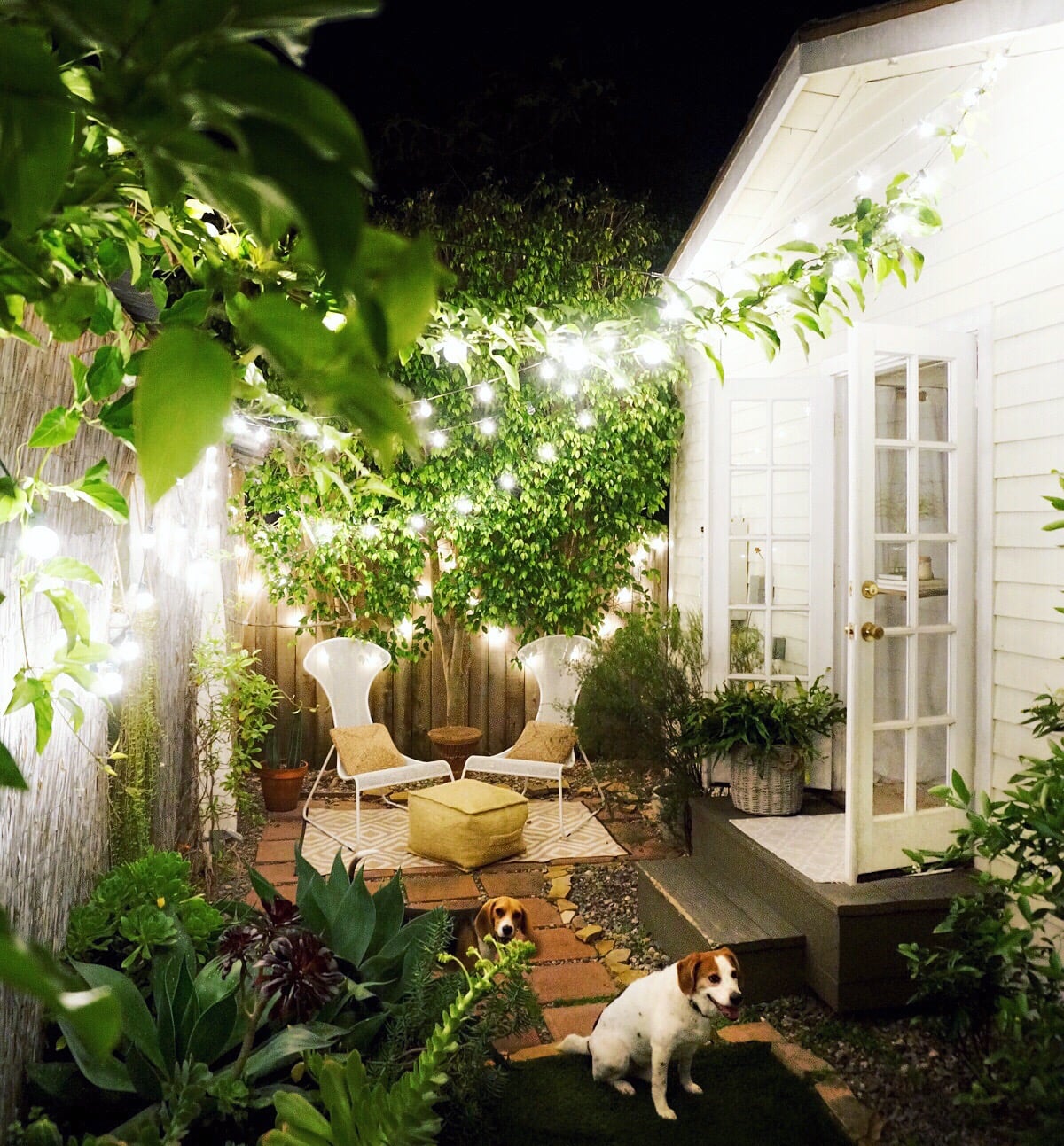 The Softly Glowing Backyard Is Warm And Welcoming Thanks In Large