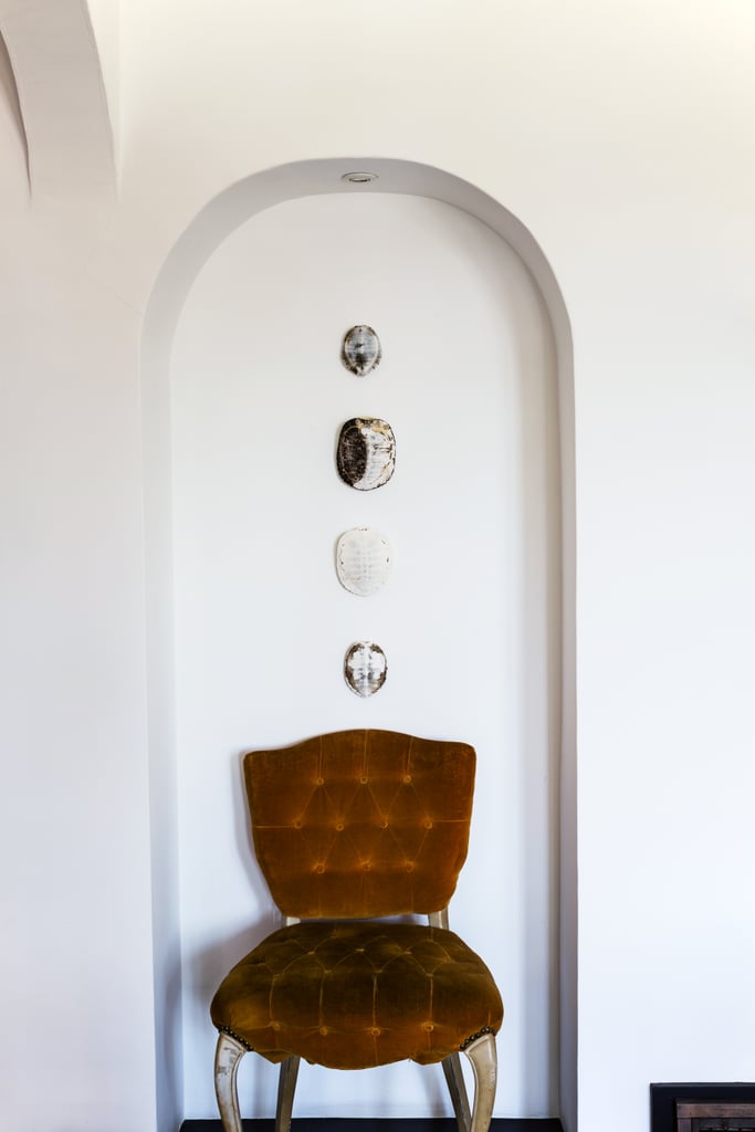 Making the most of every nook, Lizzie displays turtle shells and a vintage button-tufted chair in a small alcove.
"It's so bright and breezy—I wanted to let the space be the space." —Lizzie Garrett Mettler