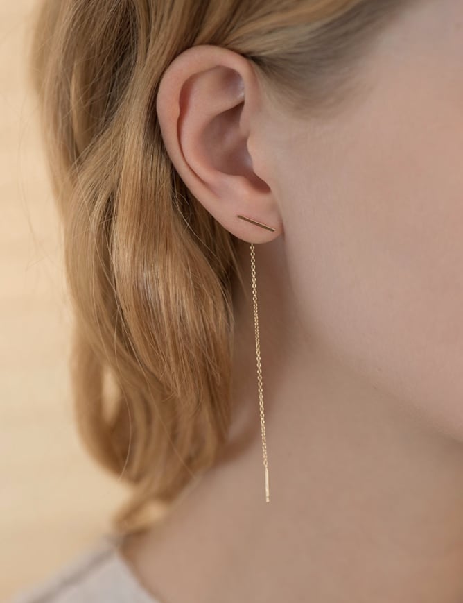 "I actually have this earring and get so many compliments on it. It's the perfect dainty, but strong piece."
Kathleen Whitaker Staple + Chain Earring ($150)
