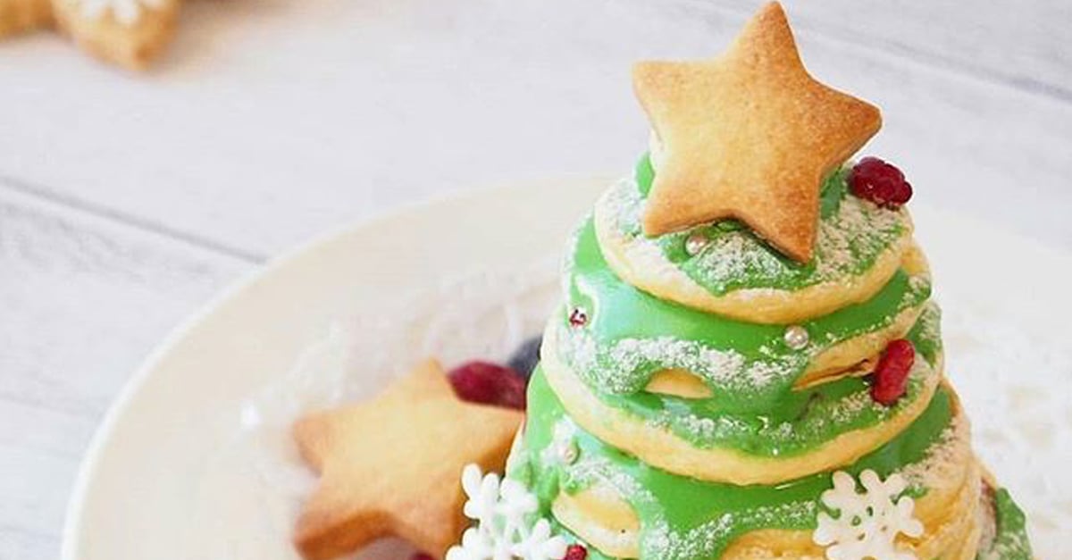 Image Of Green Pancake Shaped As Christmas Tree Cooking In Nonstick Frying  Pan For Childrens Breakfast On Xmas Day Christmas Tree Pancakes Ready To Be  Decorated With Fruit Baubles And Star Shaped