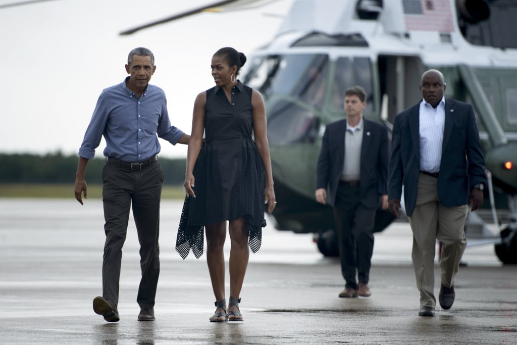 Michelle wearing a black shirtdress with mesh overlay in Cape Cod.