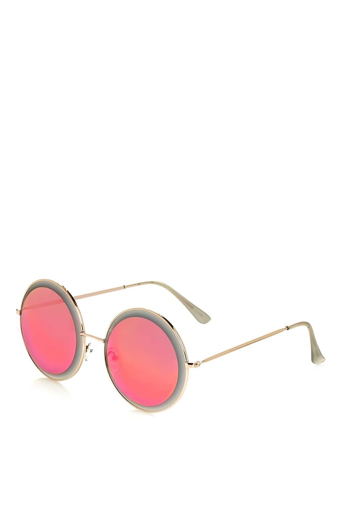 Have fun and go bright pink with this pair of oversize Topshop Bevelled Round Sunglasses ($38).
