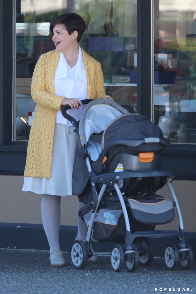 Snow White (Ginnifer Goodwin) pushed around a stroller.