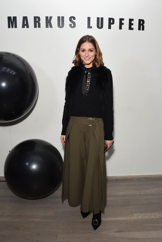 Olivia kept her outfit colors dark and neutral at the Markus Lupfer show.