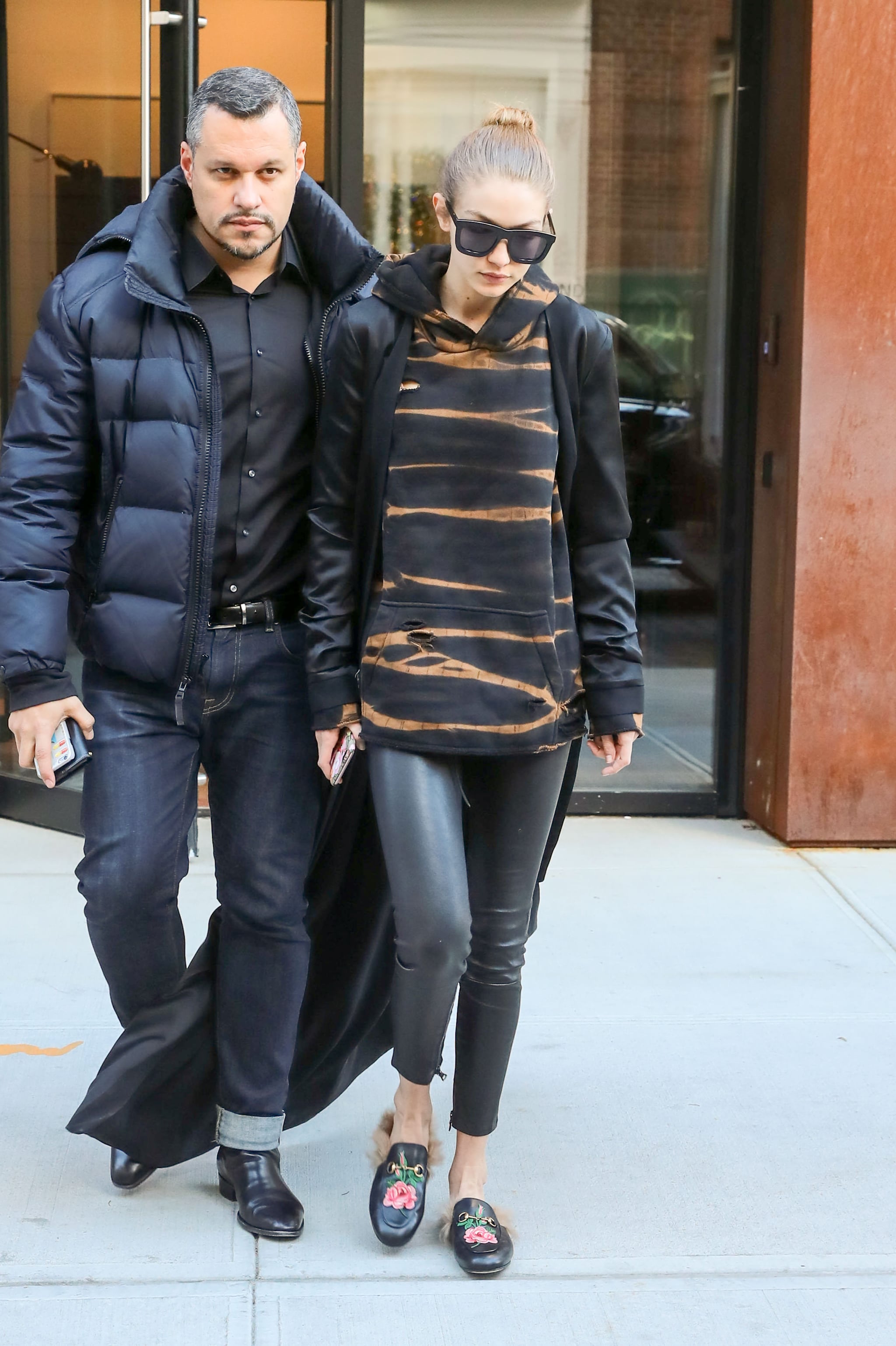Gigi Hadid Wore A Printed Pullover With Leather Jacket And
