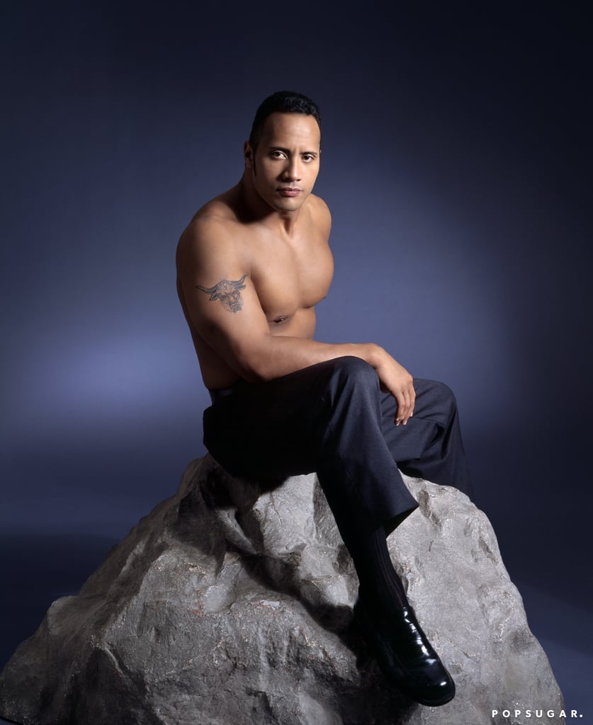 Dwayne Johnson Posing With A Rock Photos POPSUGAR Celebrity Photo