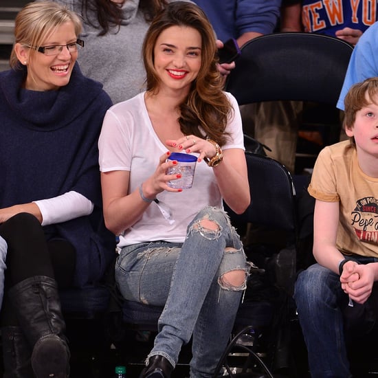 Miranda Kerr in White T-Shirt and Distressed Jeans