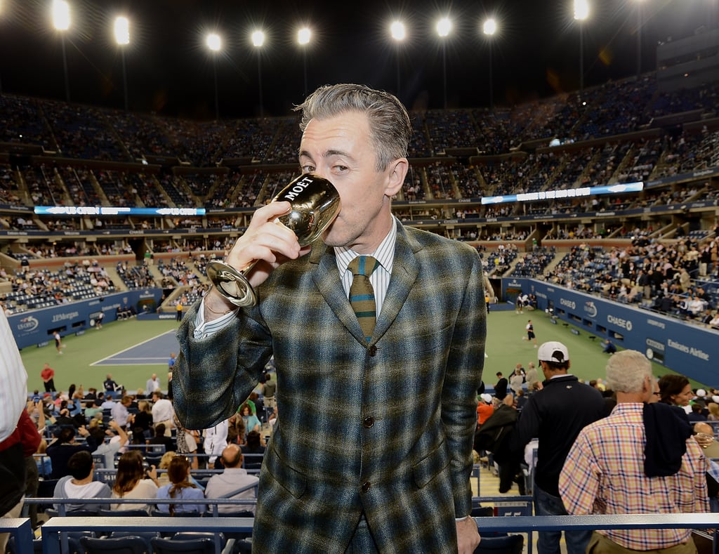 Alan Cumming looked dapper in a plaid suit to indulge in a beverage at the US Open.
Alan Cumming looked dapper in a plaid suit to indulge in a beverage at the US Open.