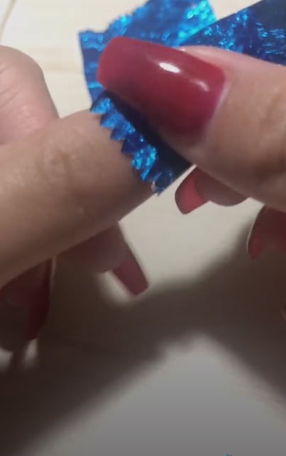 Press the Foil Sticky Side Down on Your Nail