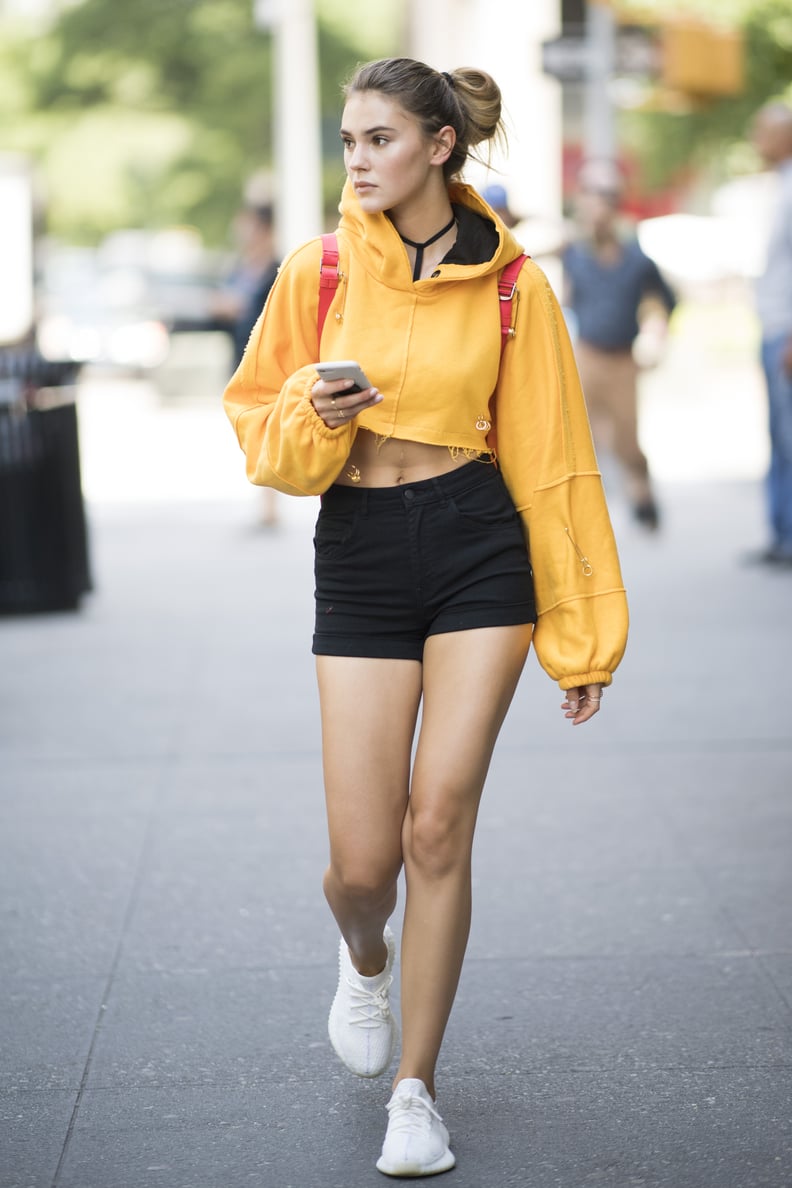 Go For an Athleisure Look With a Cropped Hoodie and Black Shorts