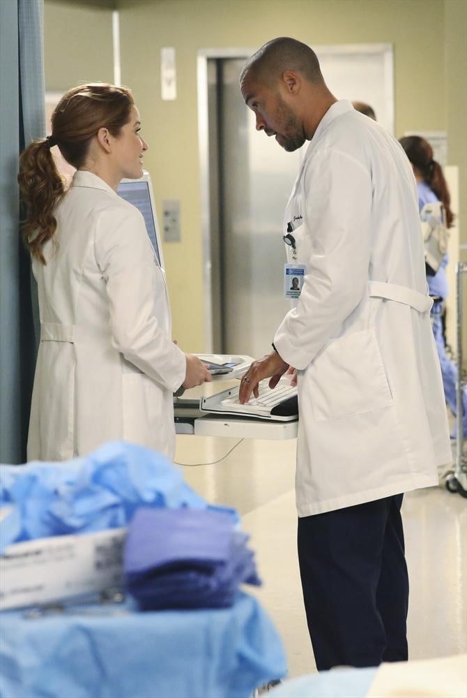 April and Jackson (Jesse Williams) chat.