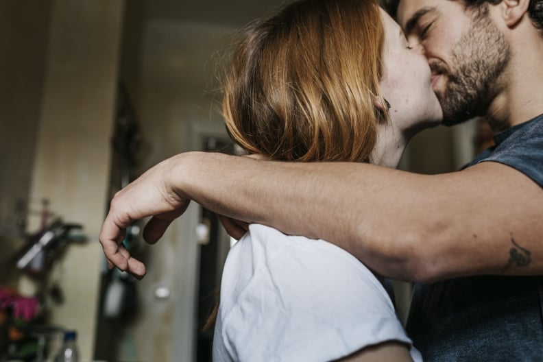 Couple Affectionately Kissing Each Other