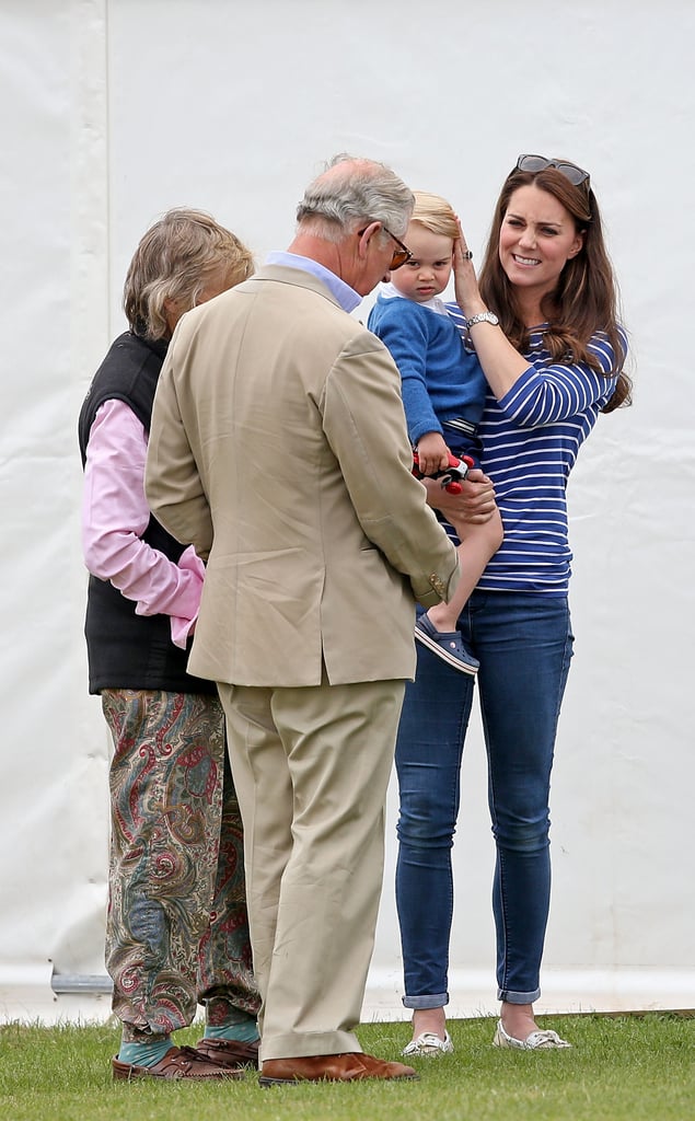 A tender moment between three generations at a polo match.