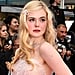 Elle Fanning Attends the Cannes Film Festival in a Blush-Pink Ball Gown