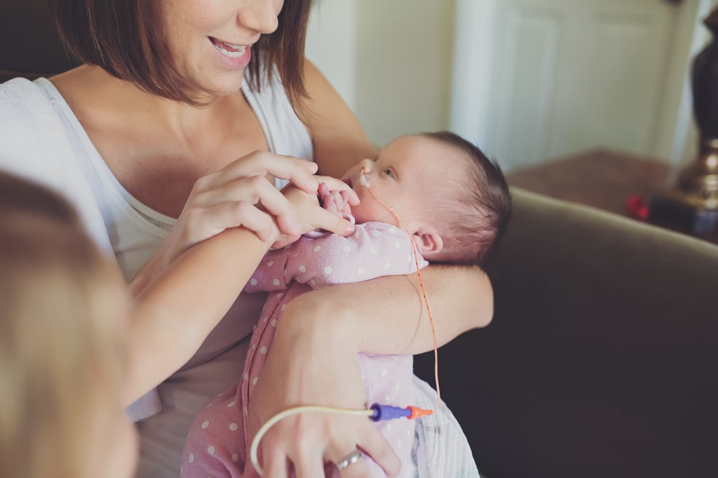 Newborn With Inoperable Tumor in Family Photos