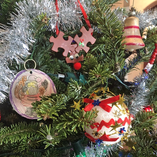 Decorating Family Christmas Tree With Mismatched Ornaments